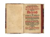 un vieux livre ouvert, dévoilant une page de texte sur fond blanc