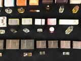 a lot of different types of perfumes on the table