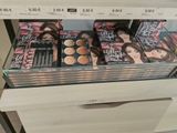 a lot of makeup products on display in a store