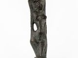 a bronze statue of a woman holding a baby in her arms