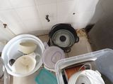 a lot of trash in the bathroom that needs to be cleaned