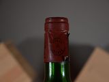 a bottle of wine that is sitting on a table