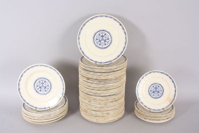 a lot of plates that are stacked on top of each other