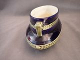 a cup and saucer sitting on a table