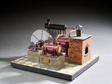 figurine représentant une maquette de camion de pompiers posée sur un échiquier
