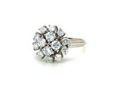 an image of a diamond cluster ring on a white background