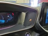 dashboard of a car with a digital display on the dash