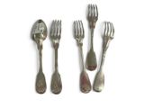 four forks and two spoons on a white surface