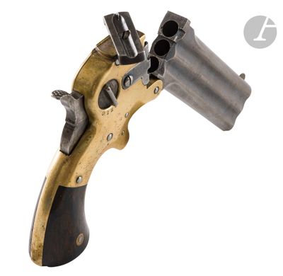 a close up of a revolver on a white background