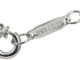 a silver key chain with a name tag attached to it