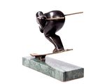 statue of a man on a skateboard on a marble base