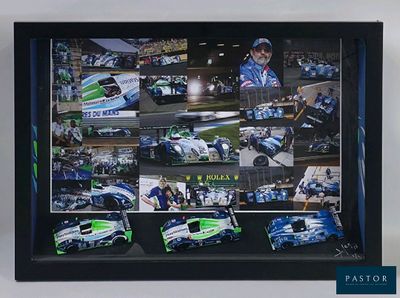 a picture of a framed picture of a race car