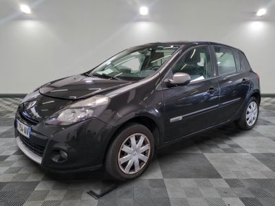 a picture of a black car that is on a checkered floor