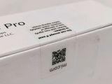 a white box with a qr code on it