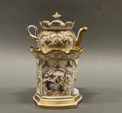 a white and gold teapot with a painting on it