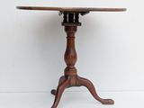 an old wooden table with a wooden top on a white background