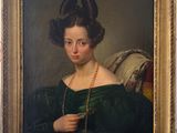 painting of a woman in a green dress with a gold chain