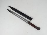 two knives that are laying next to each other on a table