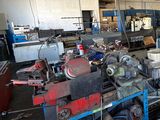 many machines that are sitting in a room