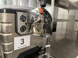 a machine that is sitting on the floor in the kitchen