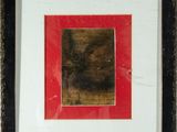 framed photograph of a picture of a red square in a black frame