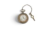 an old pocket watch with a key hanging from it ' s side
