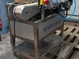 a machine that is sitting on a pallet in a warehouse