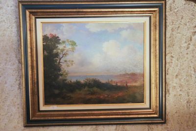 a picture of a painting hanging on the wall