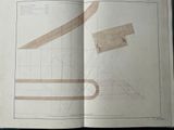 an open book with a drawing of a plane on it