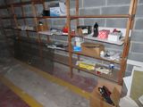 a room that has a bunch of shelves and boxes on it