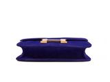 a purple purse with a gold clasp on it