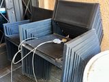 two chairs that are sitting on a wooden deck