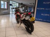 a motorcycle that is parked in a building