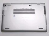 an open laptop computer sitting on top of a white table