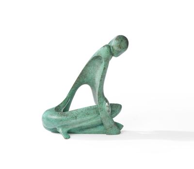 sculpture of a man sitting on a surfboard on a white surface