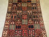 an old rug with many different colors and patterns