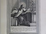 an old book with a picture of a woman sitting on a bed
