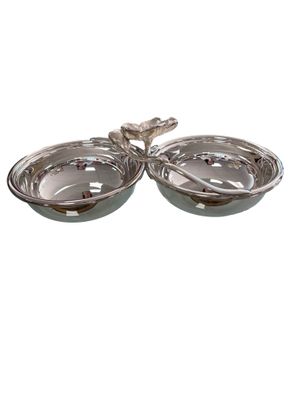 pair of silver plated serving dishes with handles and spoons