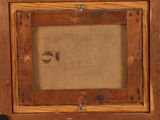 an old picture of a picture of a wooden frame with a picture of a fish