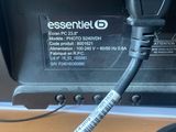 a cable connected to a computer monitor on a desk