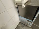 an image of a small kitchen with a microwave in it