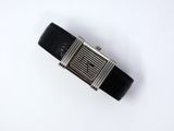 an image of a wrist watch on a white surface