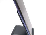 a close up of a cell phone on a stand