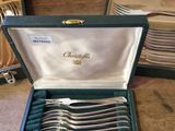 a box of silverware that is sitting on a table