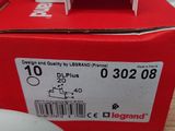 a red box with a white label on it that says legrand