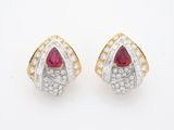 une paire de boucles d'oreilles en rubis et diamants