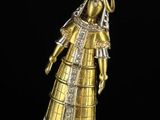 an image of a gold and diamond pendant