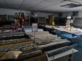 a room filled with lots of different types of fabrics
