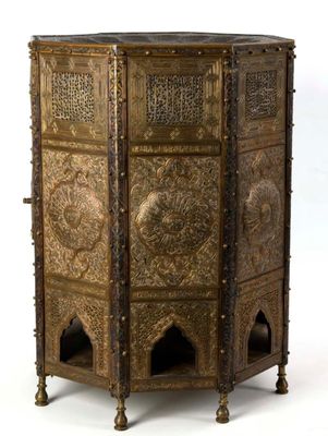 a very ornate wooden cabinet with intricate carvings on it