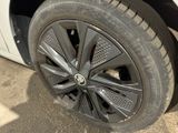 a close up of a tire on a car ' s rim